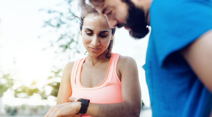 People looking at a smart watch