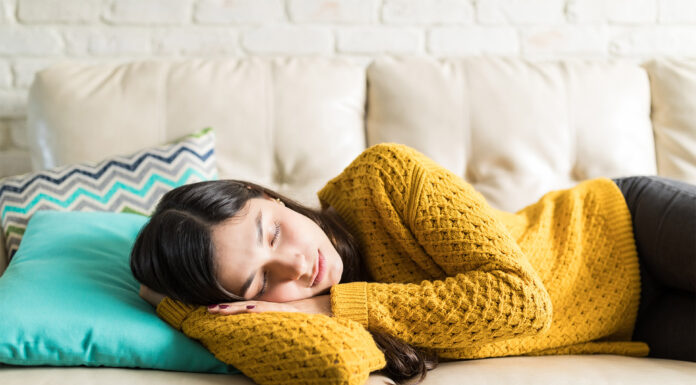 A woman sleeping on the sofa