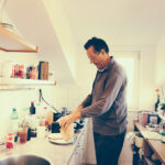 Happy Senior Caucasian Man in Pajamas Preparing Breakfast, Brac, Croatia