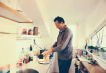 A man in kitchen