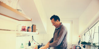 A man in kitchen