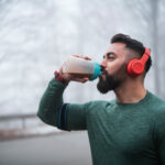 Man Drinking Energy Drink After Exercising.