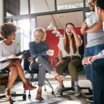 Group of young business professionals having a meeting