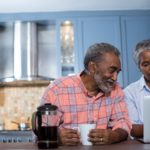 Couple looking at laptop