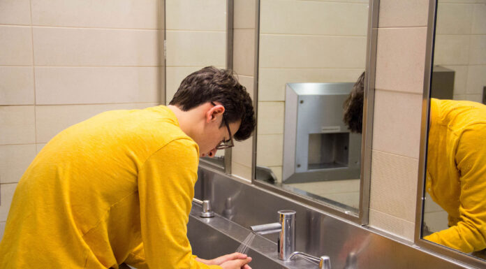 A man washing his hands