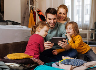 Family looking at a tablet