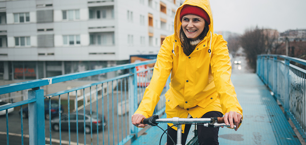 Woman riding a bike.