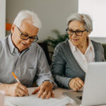 Couple sitting at a computer together