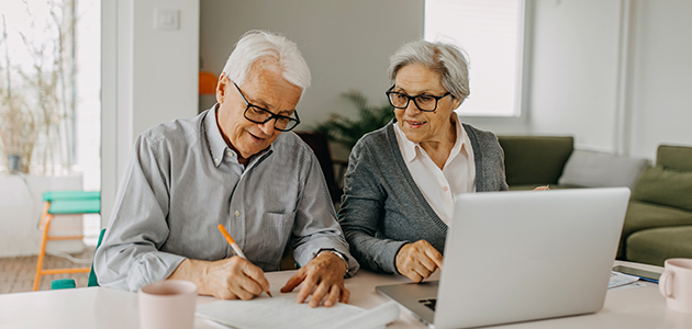 Couple sitting at a computer together