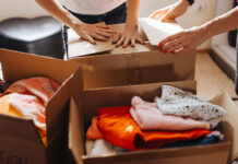 People packing boxes for a clothing drive