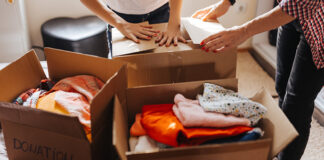 People packing boxes for a clothing drive