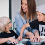 Woman baking with her children