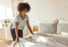 Woman making the bed