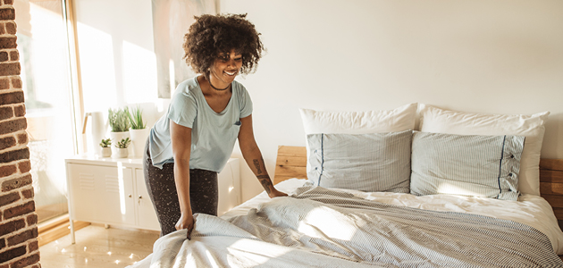 Woman making the bed