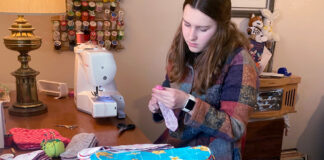 Woman sewing menstrual pads