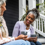 Two women sitting and chatting