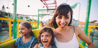 Woman and 2 children on rollercoasterrusse