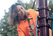 Woman working on a playground build